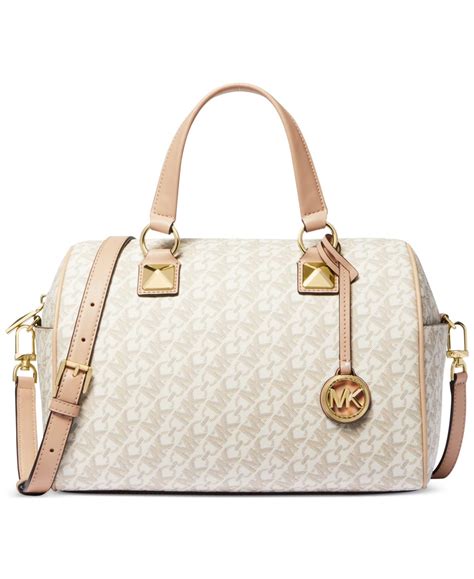 michael kors grayson duffle|Michael Kors pink suitcase.